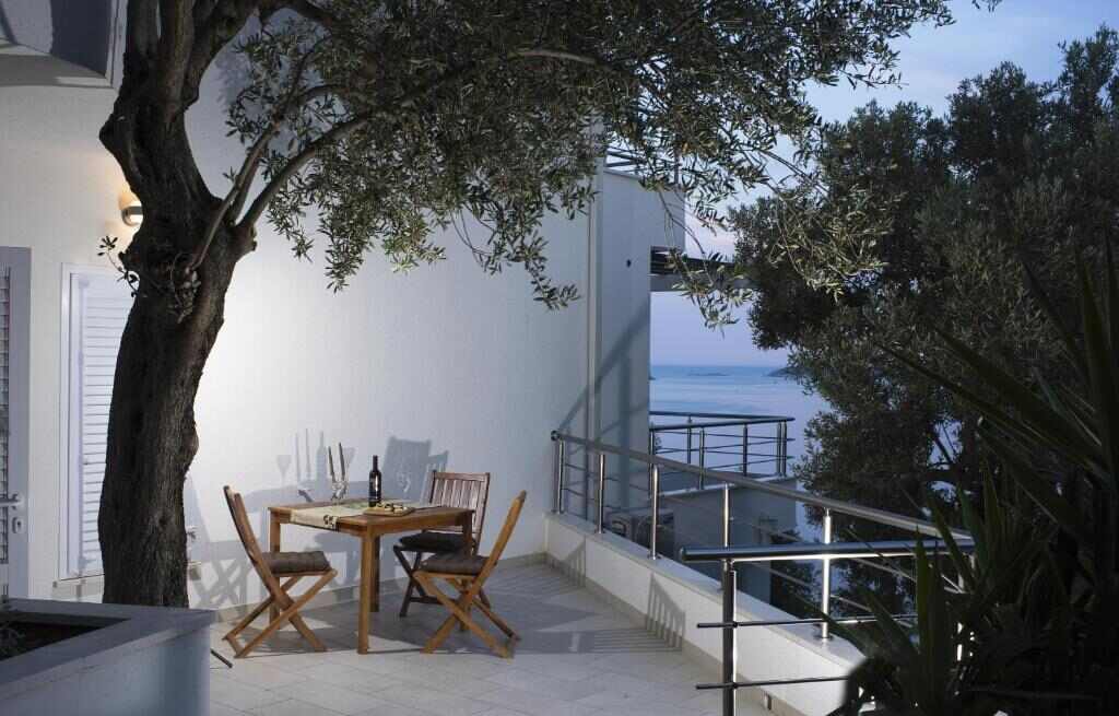 Balcony with olive tree and Adriatic view at Comfort Zovko